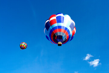Colourful hot air balloons taking off at festival