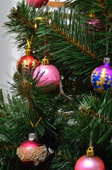 Fototapeta premium Christmas tree decorated with New Year's toys
