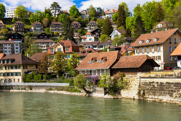 Fototapeta na wymiar Romantic streets and canals of Bern capital city of Switzerland. Swiss travel and landmarks