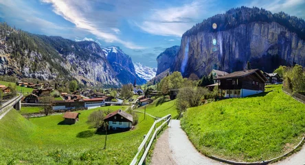 Gordijnen Amazing landscape of Switzerland Alps mountains and charming villages. Iconic village with waterfall -Lauterbrunnen © Freesurf