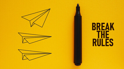 Break the rules is shown using the text and the picture of paper airplanes