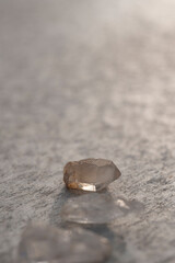 Raw Quartz crystal photographed on stone. 