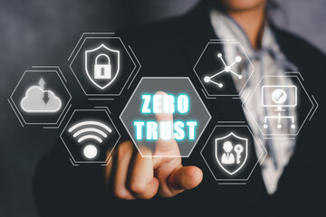 Zero trust security concept, Person hand touching zero trust icon on virtual screen.