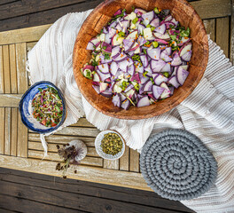 Flatlay food styling of a plate of radish salads and sides - healthy vegan lifestyle aesthetic