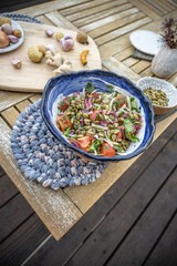 Flatlay food styling of a plate of radish salads and sides - healthy vegan lifestyle aesthetic