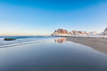Astonishing winter scenery on Uttakleiv beach at morning