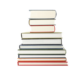 Many different books stacked on white background