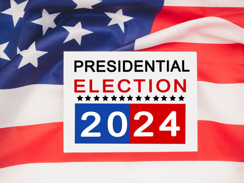 Presidential Election 2024 text on white paper over Waving American Flag