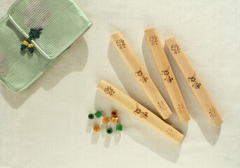 Korean traditional game 'Yut' on the pure cotton. Holiday background.
