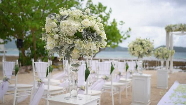 Wedding decoration to beach white sand for wedding set up.Decorated white patterns concept.	