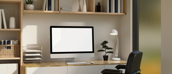 Minimalist workspace with PC desktop computer mockup and decor on minimal wood table.