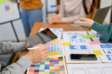 close-up image, A team of professional website and mobile application designers are in the meeting