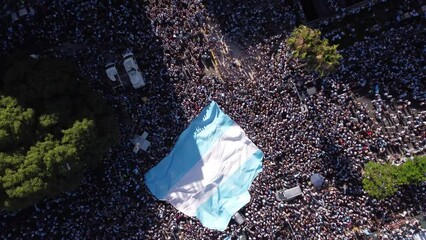 Argentina Fans Rising Big Flag, Celebrating Football soccer World Cup Qatar 2022 - Powered by Adobe