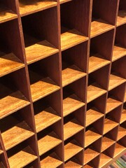 Wooden shelf with empty racks. Vintage cabinet like box.