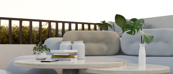 Modern beautiful restaurant outdoor seating space with comfortable sofa, coffee table and decor.