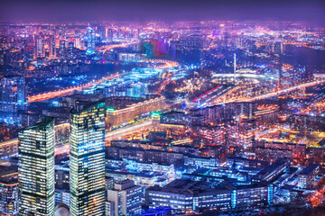 View of the city from the observation deck Panorama 360 to skyscrapers in the light of night lights and Poklonnaya Gora, Moscow City Federation Tower, Moscow