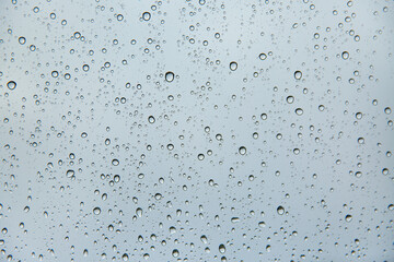 Water drops on car window glass