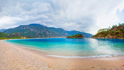Fototapeta na wymiar Oludeniz Beach And Blue Lagoon - Oludeniz beach is best beaches in Turkey - Fethiye, Turkey