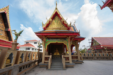 Naklejka premium Samut Sakhon, Thailand November 19, 2022. Wat Pomwichienchotikaram. It is a royal monastery of the third class, ordinary type, under the Maha Nikaya Sangha.