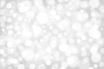 White gray bokeh background.  The concept of New Year, Christmas, Anniversary and all celebration backgrounds.