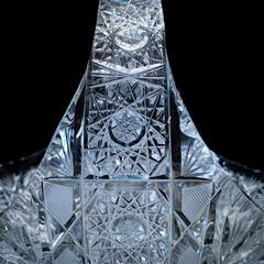 antique glass candy bowl with geometric pattern. retro jar for sweets on a black isolated background. engraved vintage candy bowl