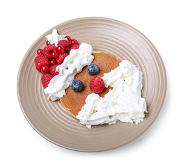 Plate with tasty pancake in shape of Santa Claus on white background