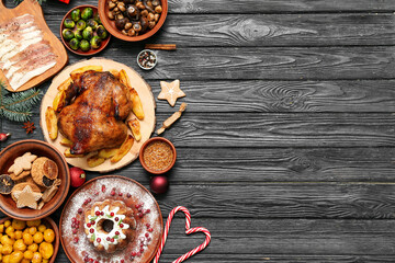 Different tasty dishes for Christmas dinner on table