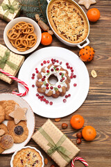 Different tasty dishes for Christmas dinner on table