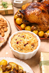 Christmas table setting with tasty pie on beige background, closeup