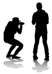 Woman with a photo camera on white background