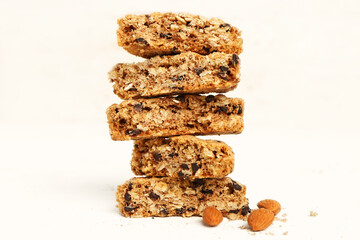 Tasty biscotti cookies and almond nuts isolated on white background