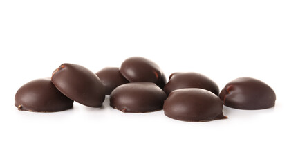 Heap of chocolate bird's milk candies on white background