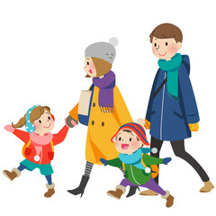 冬に旅行に出かける家族