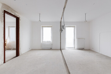 Fototapeta premium Empty concrete commercial space without finishing with partitions