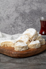 Kavala cookies on a dark background. Sweet almond cookies. Bakery products. close up