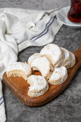 Kavala cookies on a dark background. Sweet almond cookies. Bakery products. close up