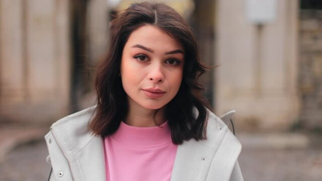Close-up portrait of nice-looking  beautiful businessperson elegant young woman looking into camera. Career people. Fashion, beauty. Female portraits.