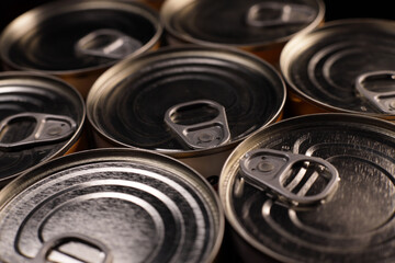 Background, texture from cans for tinned food, canned food, humanitarian aid concept
