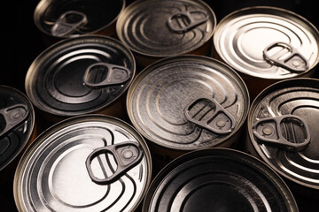 Background, texture from cans for tinned food, canned food, humanitarian aid concept