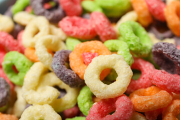 Concept of breakfast food, colorful corn flakes, close up