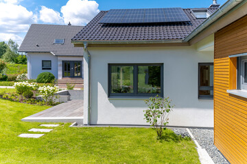 modernes Einfamilienhaus mit Garten in Wohnsiedlung - 556410104
