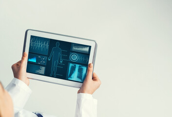 Close of female doctor hands working with tablet pc computer