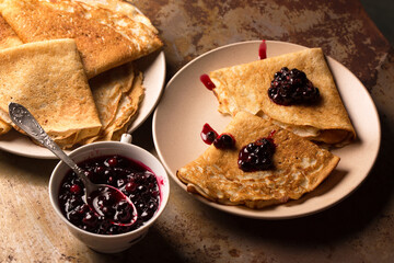 blackcurrant jam and pancakes