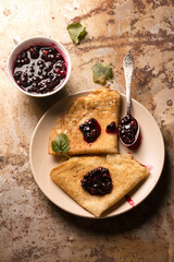 ruddy pancakes with blackcurrant jam