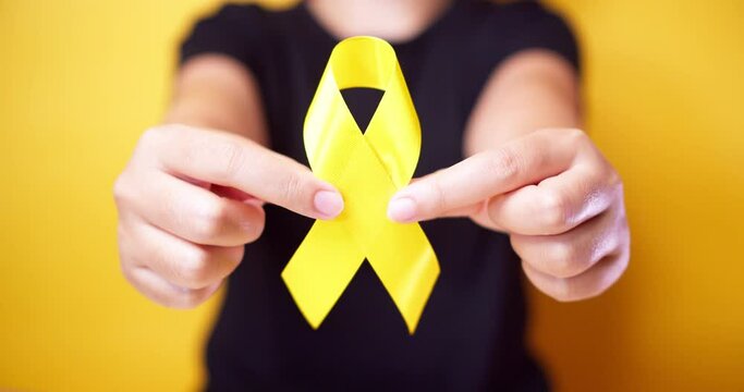 Suicide prevention day, Sarcoma, bone, bladder and Childhood cancer Awareness month, Yellow Ribbon for supporting people living and illness. children Healthcare and World cancer day concept