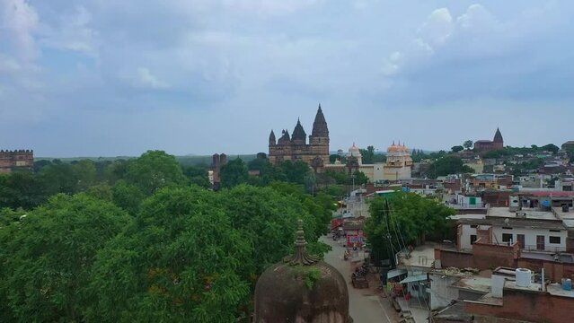 Drone Ascending On Orchha Historical Town With Ancient Monuments And Hindu Temples In Madhya Pradesh, India. Aerial Shot 