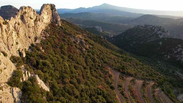 Aerial view of les Dentelles de Montmirail in front of the Mont Ventoux in the french alps