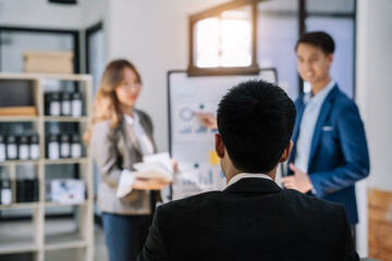  Business project team working together at meeting room at home office in the morning.