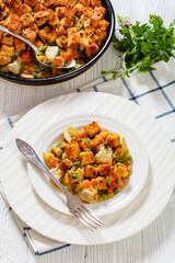 turkey pot pie with stuffing crust on plate