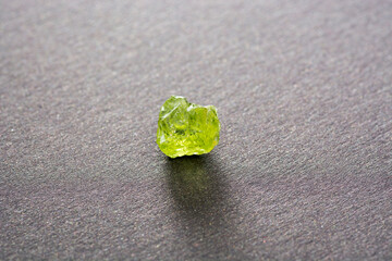 Natural chrysolite, peridot, olivine apple green color transparent raw rough crystal. Earth mined...